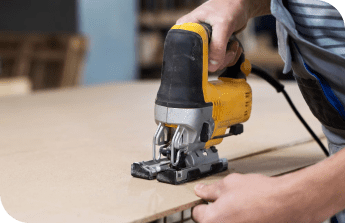 man working cutting mdf